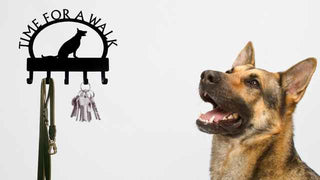 A picture of a German Shepherd dog and a leash hanger with a silhouette of a German Shepherd and the words Time for a walk.