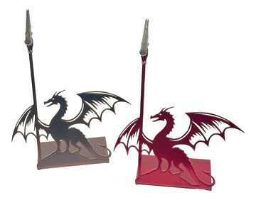 Two dragon-shaped place card holders, one black and one red, on a white background.