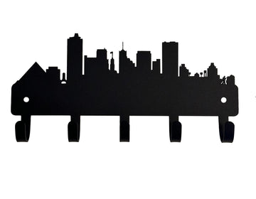 A silhouette of Memphis city skyline, cut from metal and with 5 hooks for hanging keys. 