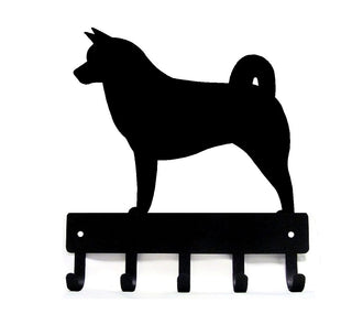 An Akita dog solhouette cut from metal with 5 hooks for hanging keys and leashes