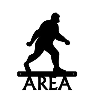 A metal sign with an outline of bigfoot and the word AREA below it.