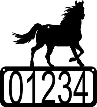 A metal address sign for house numbers with a black horse