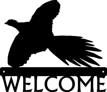 A metal silhouette of a flying pheasant with the word Welcome below.