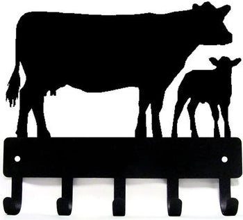 A metal cow and calf cut from the metal and with 5 hooks for hanging keys.