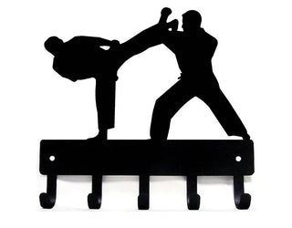 A key holder with karate sparring. 5 hooks for keys.