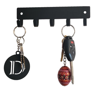 Key hanger with keys and a keychain with the initial D