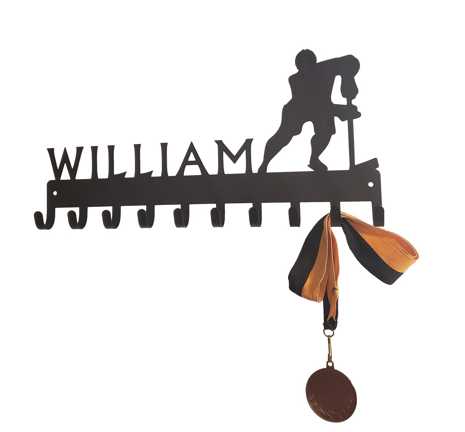 Hockey medal hanger with a hockey player and the name William