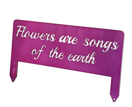 Flowers are songs of the earth sign in pink