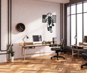 Office with a metal art laser cut into design of an EOD tech and US Flag. 