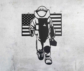metal art laser cut into design of an EOD tech and US Flag. 