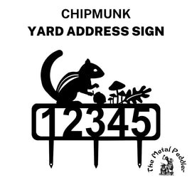 A chipmunk address sign featuring customizable numbers and three stakes at the bottom for easy lawn mounting.