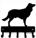 Black silhouette of an English Shepherd dog on a metal key rack with 5 hooks on a white background. The Metal Peddler