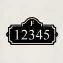 Heritage Monogram personalized metal address sign with custom house numbers on a stucco wall