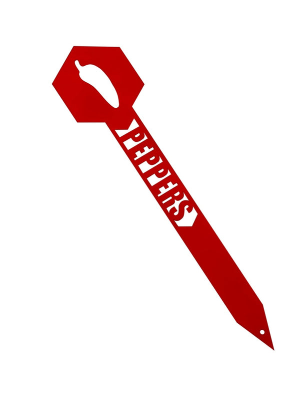 A red garden stake with the word Peppers and a small cut out chili design.
