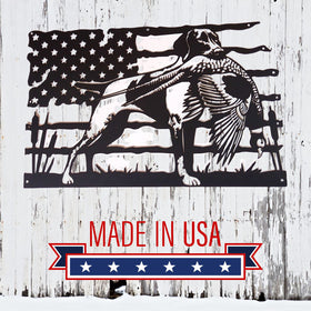 Decorative metal sign with American flag, pheasant, and GSP gundog on a wooden background with 'Made in USA' text.