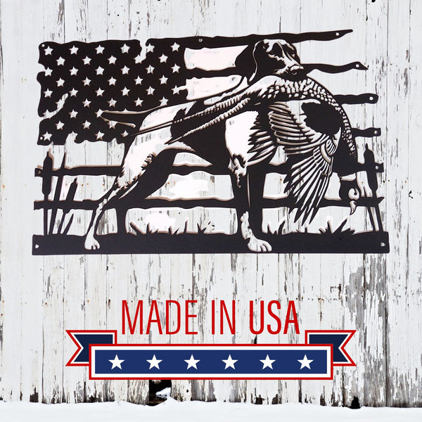 Decorative metal sign with American flag, pheasant, and GSP gundog on a wooden background with 'Made in USA' text.