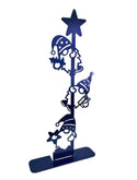 3 blue gnomes climbing a pole with a star