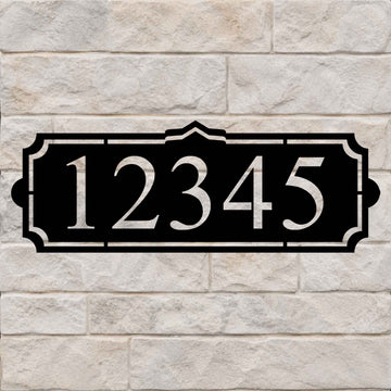 Address sign with a simple crest and large house numbers