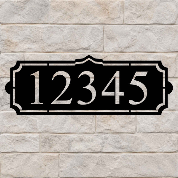 Address sign with a simple crest and large house numbers