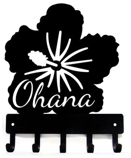 Black metal key holder with 'Ohana' text and flower design on a white background