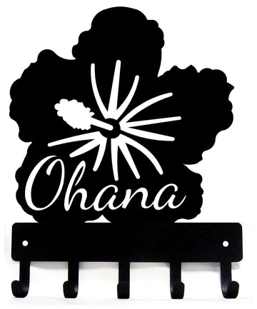 Black metal key holder with 'Ohana' text and flower design on a white background