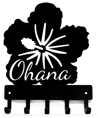 Black metal key holder with 'Ohana' text and flower design on a white background