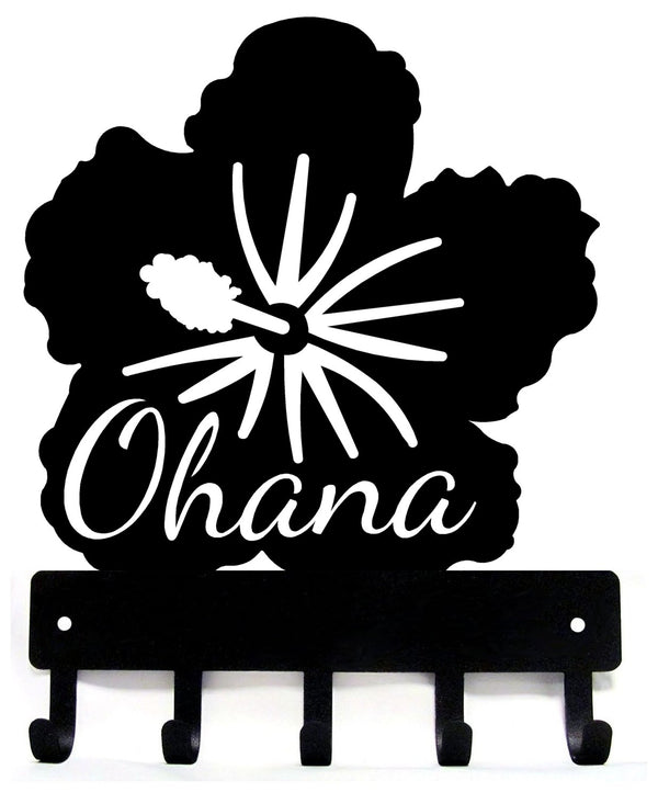 Black metal key holder with 'Ohana' text and flower design on a white background