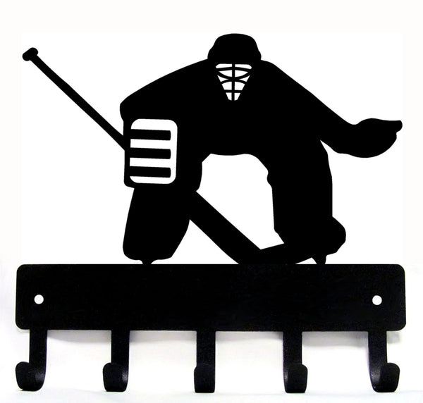 A key hanger with 5 hooks and the design of a Hockey Goalie