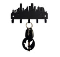 A silhouette of Houston city skyline, cut from metal and with 5 hooks for hanging keys. 