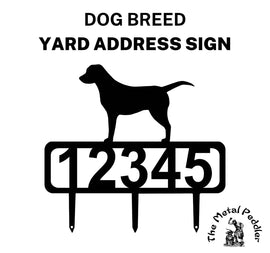 An addres sign with a labrador dog and 3 stakes for mounting on a lawn.