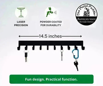 Plain medal hanger with 10 hooks. It has keys hanging on it. 