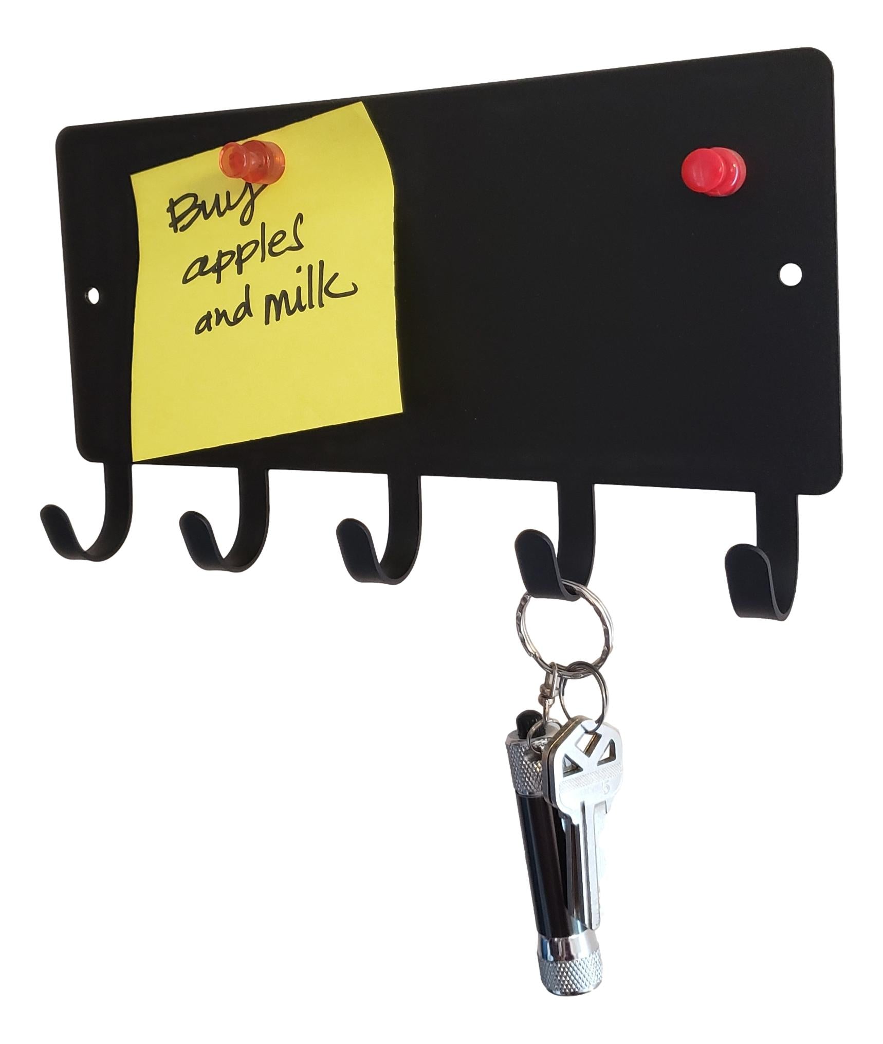 A simple key hanger with a section for adding memo notes with magnets