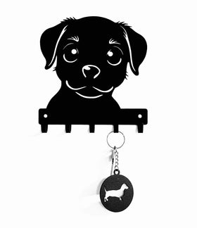 Black dog-shaped key holder with a hanging keychain on a white background