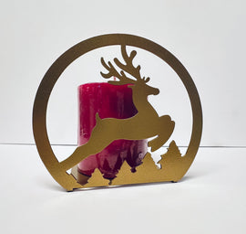 Decorative candle holder with reindeer silhouette on a white background