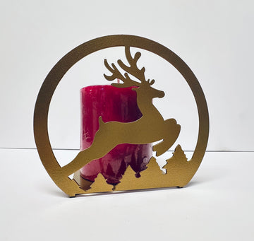 Decorative candle holder with reindeer silhouette on a white background