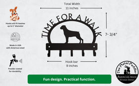 Infograph shows the overall dimensions of the rottweiler leash hanger are 11 inches wide and 7.75 inches high. Made in the USA with American steel. Powder coated for durability. Hooks will fit leashes up to 1 inch diameter.