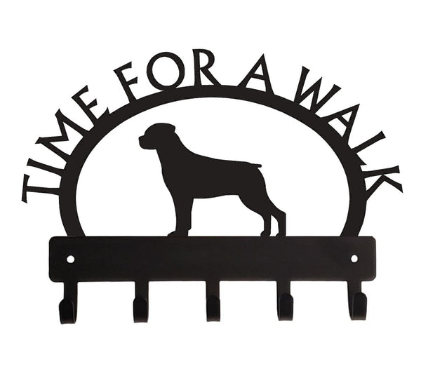 A metal hook bar with a rottweiler Dog silhouette and the words Time for a walk in an arch over the top. There are 5 hooks, It is all cut from metal with a black finish.
