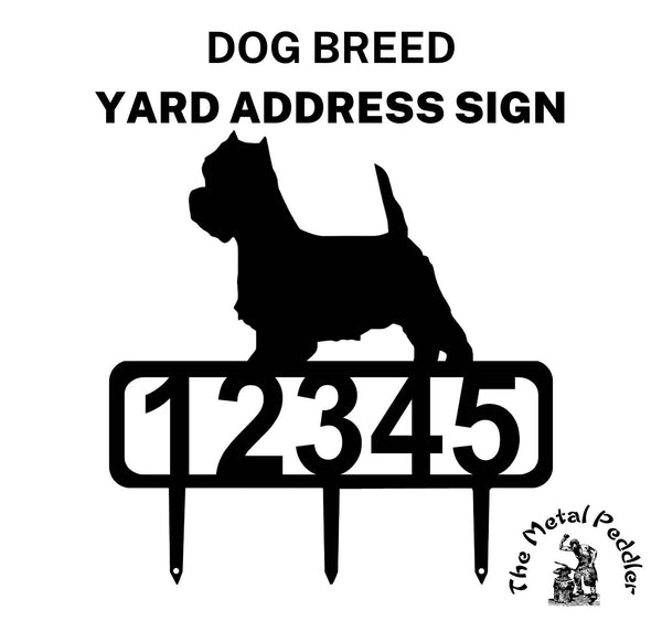 An addres sign with a west highland terrier dog and 3 stakes for mounting on a lawn.