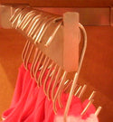 S Hooks used to hang tank tops in a retail store