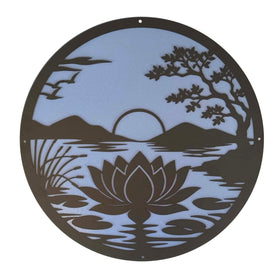 Decorative metal wall art with a landscape design featuring a lotus flower, trees, and mountains.