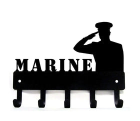 Black silhouette of a Marine saluting with 'MARINE' text on a white background
