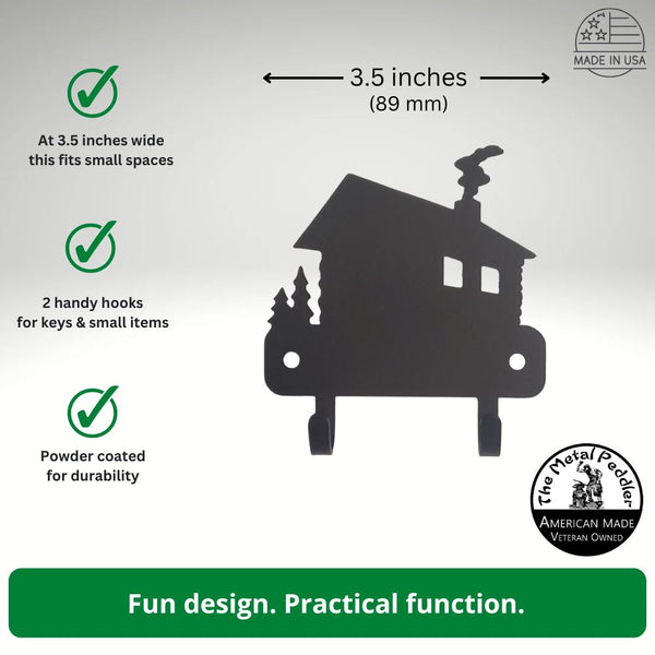 Metal wall hook with house design, featuring text on dimensions and features, on a gray background.