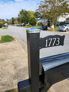 This 4x4 stainless steel post cap on a black mailbox post and address post looks fresh and modern.